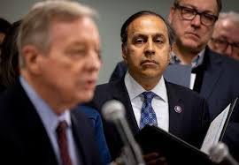 Raja with Democratic leadership